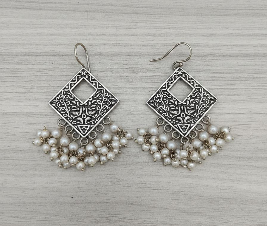 Silver lookalike earrings 